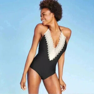 Sea Angels NWT one piece women’s bathing suit. Black with lace neckline size M